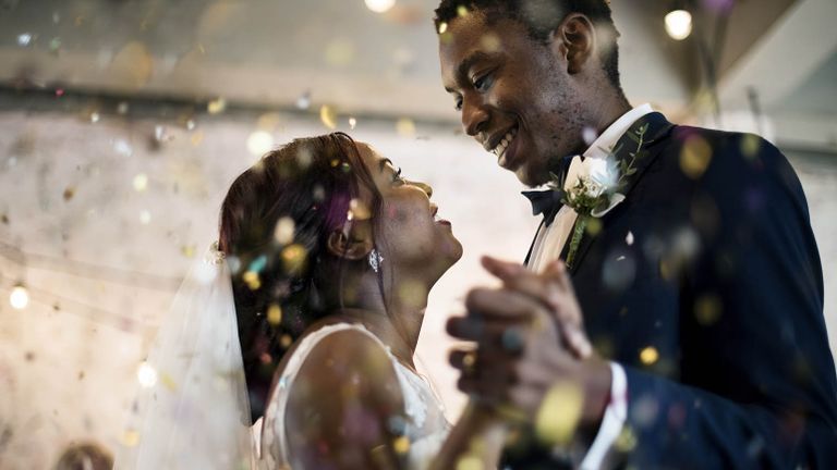 Married couple dancing at their wedding
