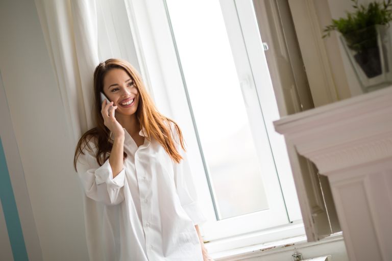 Woman reaching out to someone on the phone