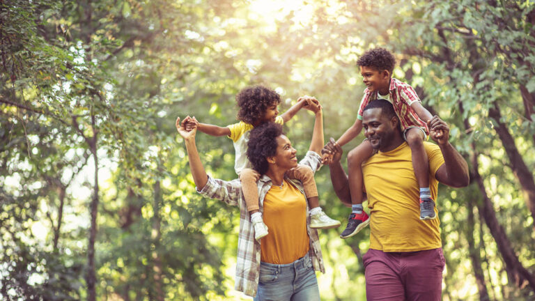 Family doing a nature walk together for their spring activity